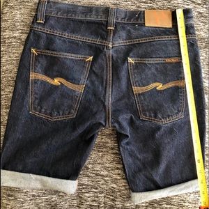 Nudie jeans denim raw cutoff shorts.